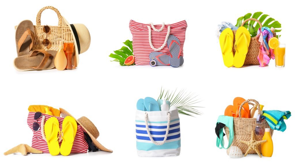 Set of beach accessories isolated on white