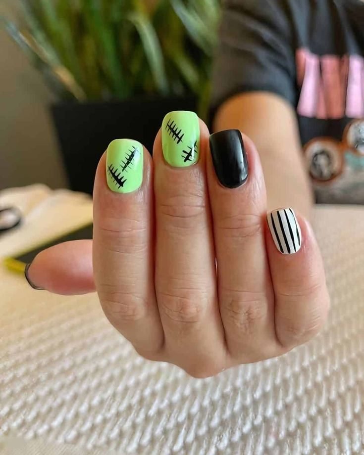 Idee unghie Halloween verdi e nere