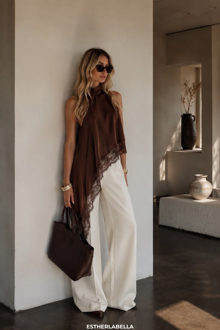 Tendenze moda autunno 2026: outfit con top assimetrico